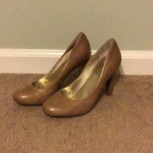 Tan leather pumps